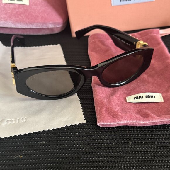 Miu Miu Black & Gold Statement Sunglasses